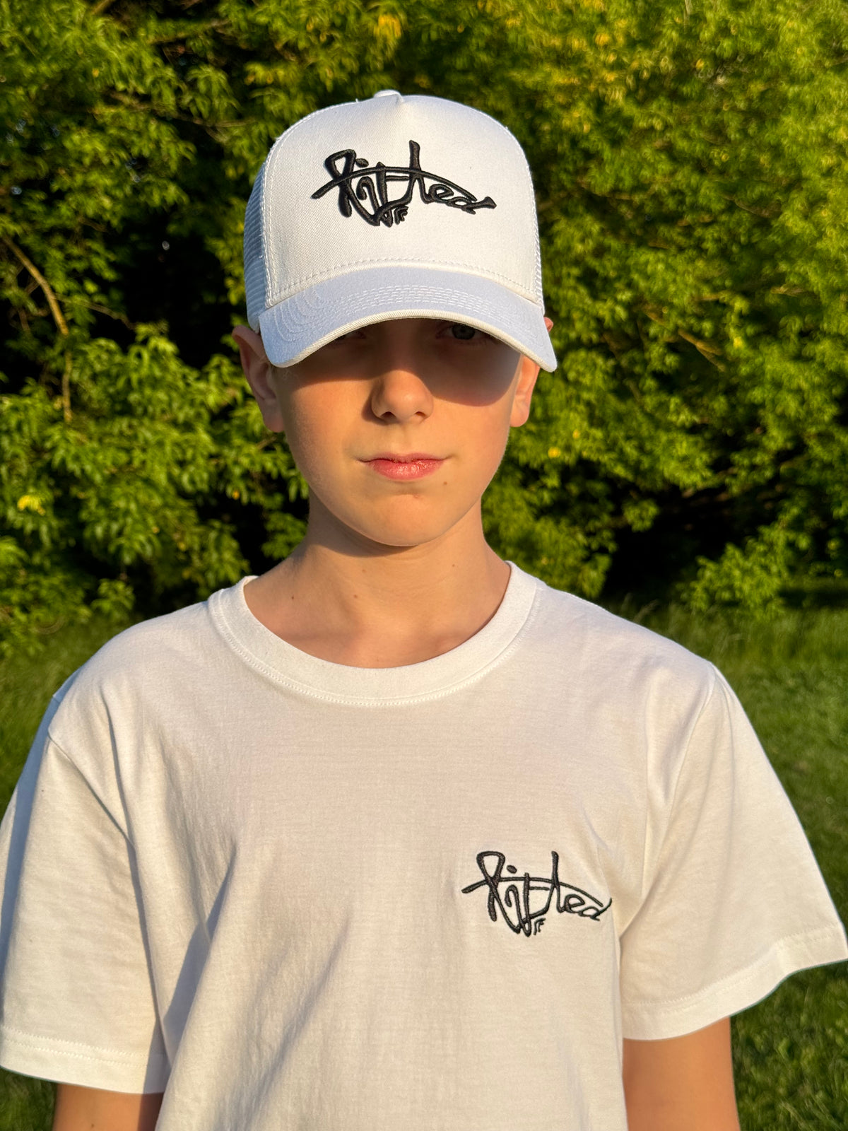 Lifted White Cap lifestyle shot, cotton cap with 3D embroidered logo