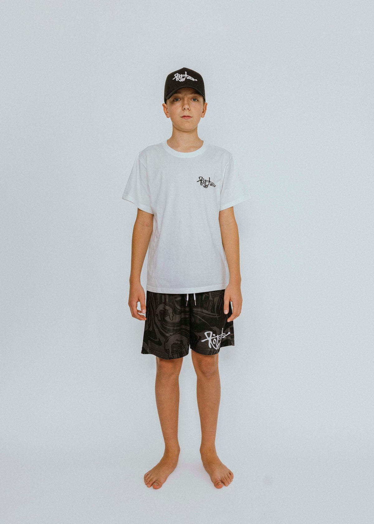 Lifted "Onyx" Shorts side view, black swim shorts