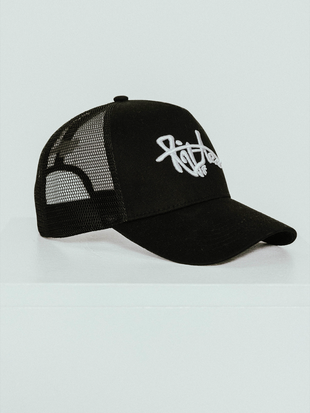 Lifted Black Cap front view, cotton cap with 3D embroidered logo