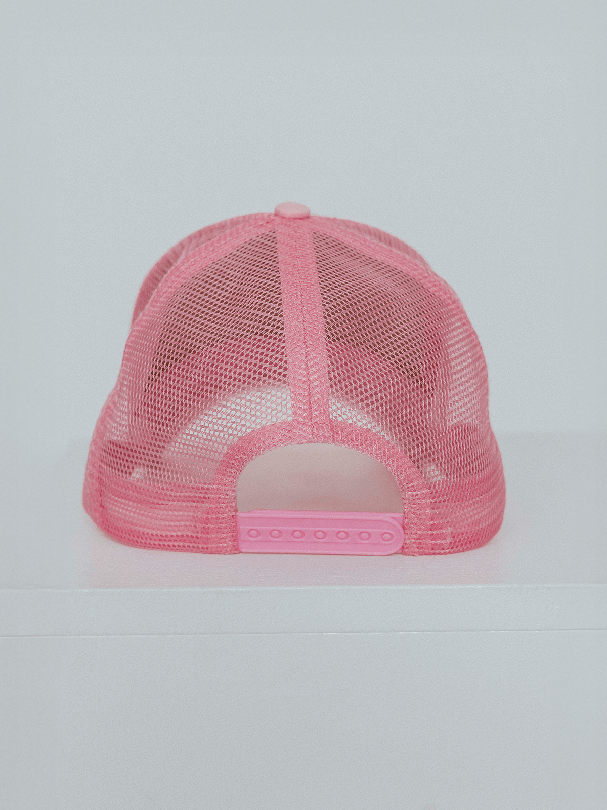 Lifted Rose Cap detail shot, cotton cap with puff-printed logo