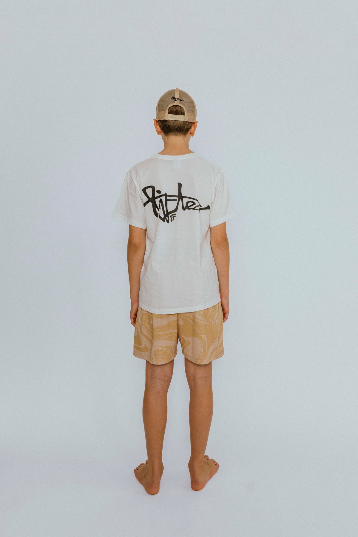 Lifted "Cream" Shorts flat lay illustration, warm cream swim shorts