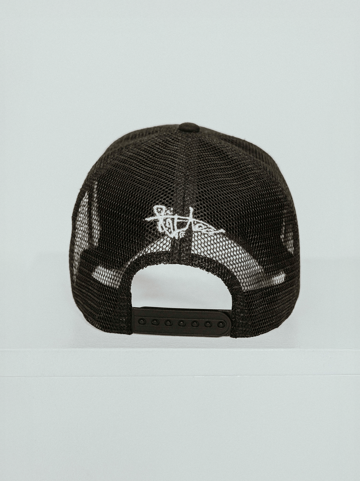 Lifted Black Cap detail shot, cotton cap with 3D embroidered logo