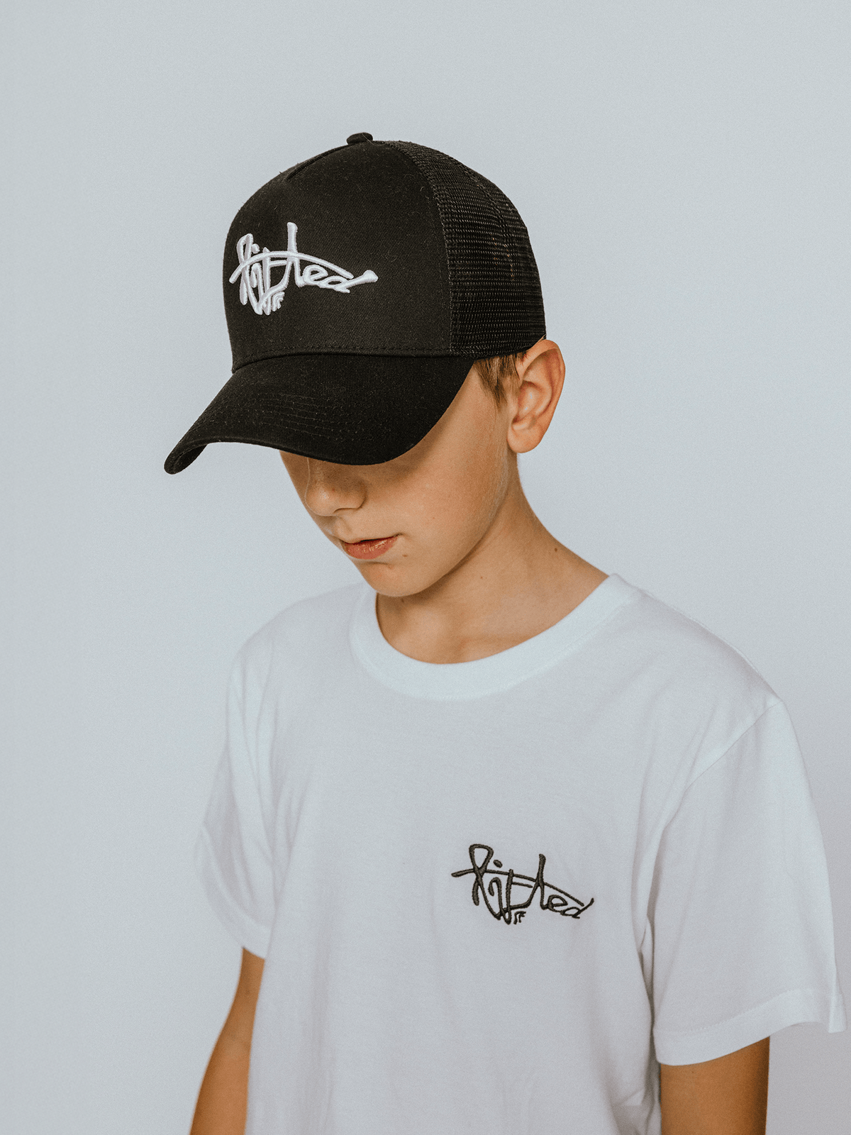 Lifted Black Cap side view, cotton cap with 3D embroidered logo