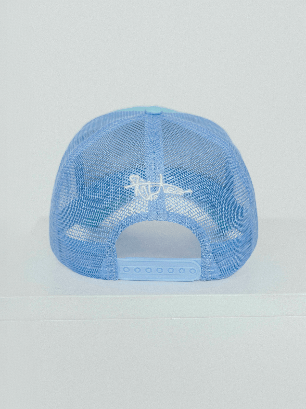 Lifted Sky Cap detail shot, cotton cap with puff-printed logo