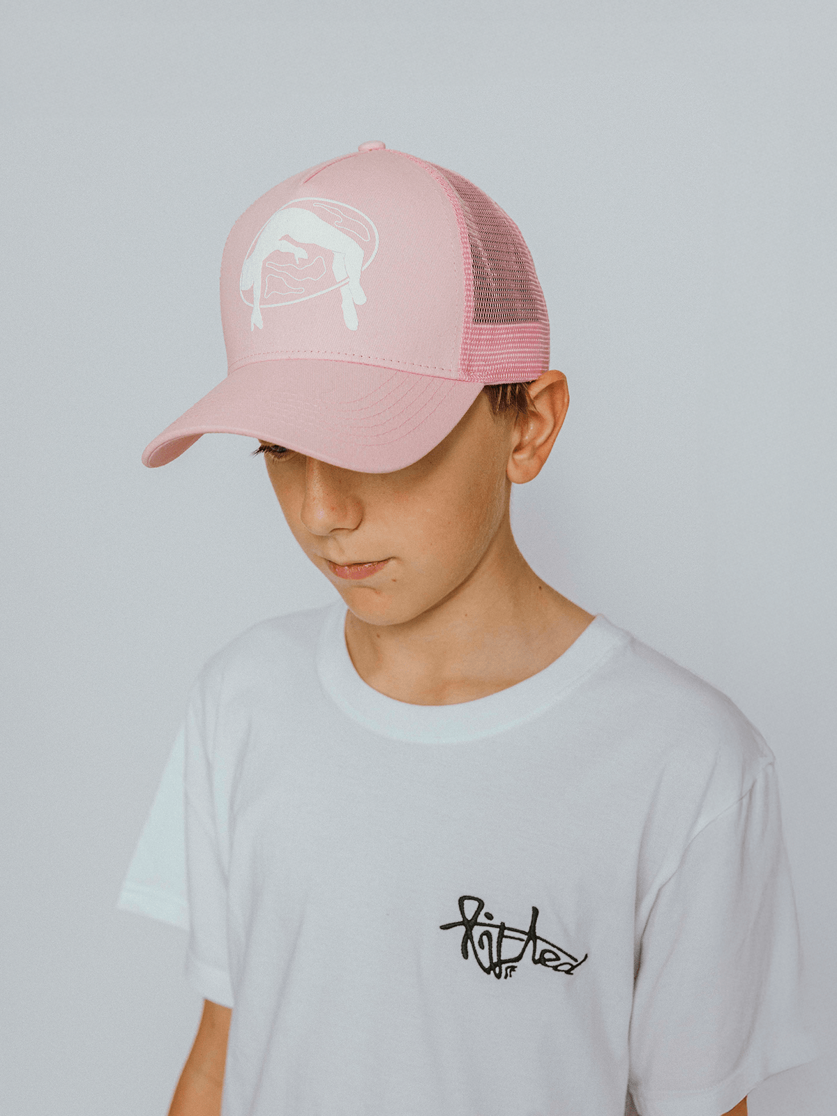 Lifted Rose Cap side view, cotton cap with puff-printed logo