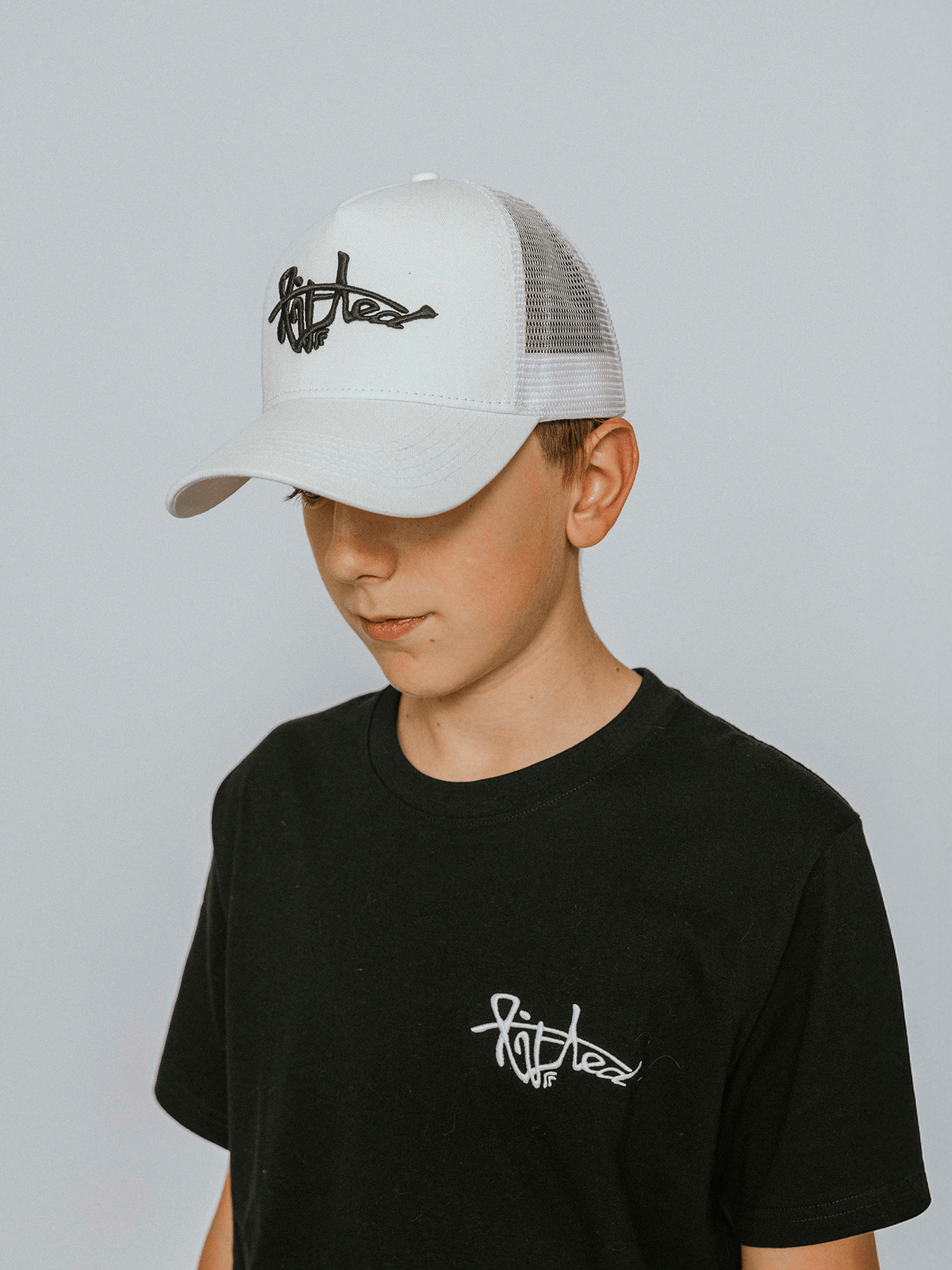Lifted White Cap side view, cotton cap with 3D embroidered logo