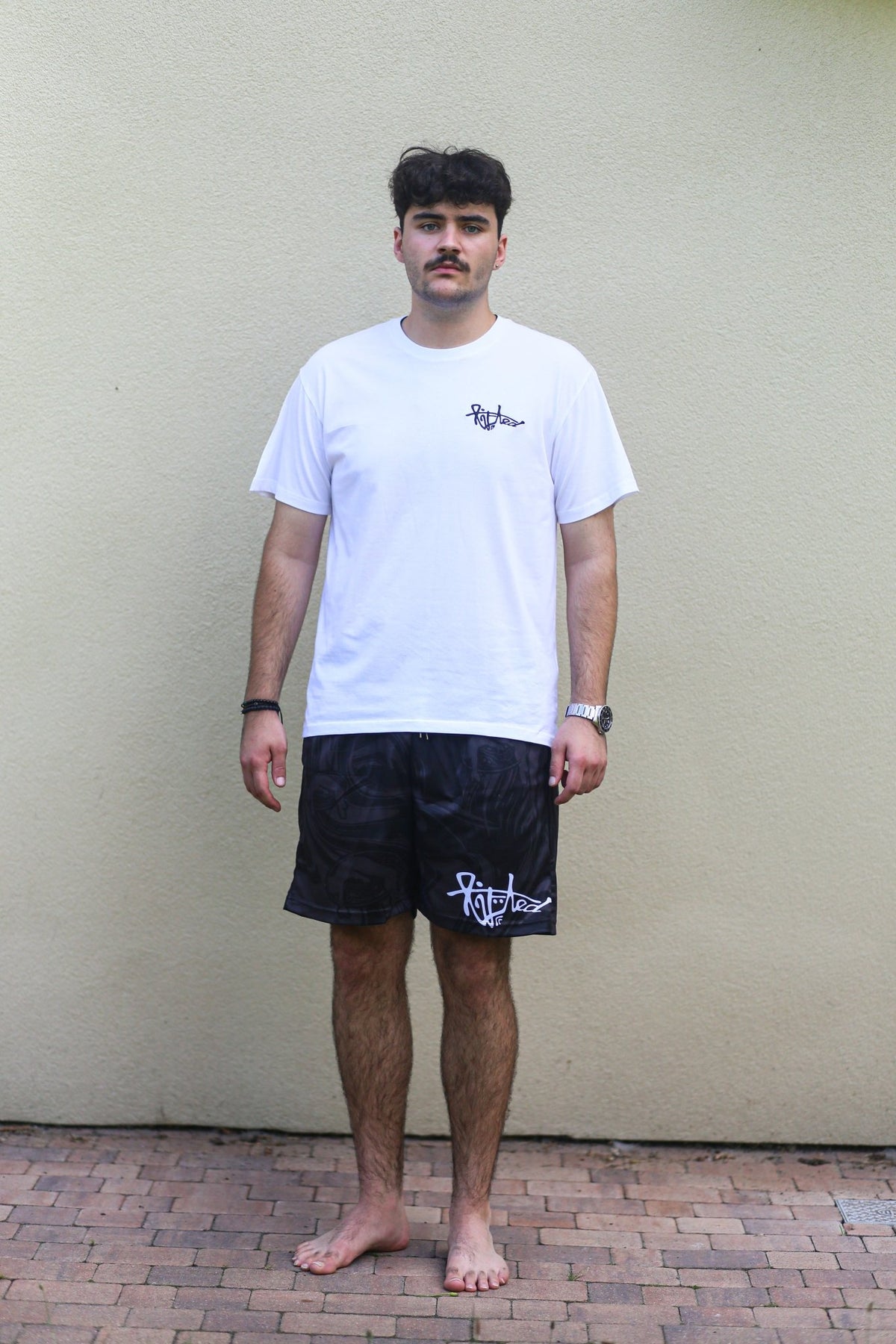 Lifted "White" T-shirt detail shot, white cotton tee